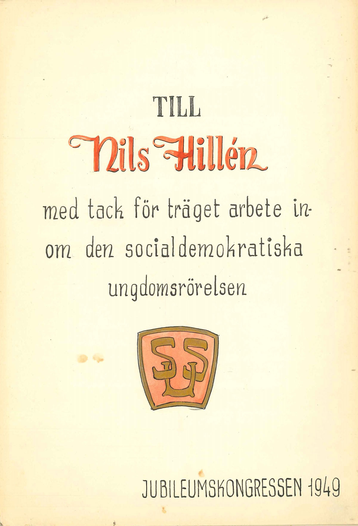 Tackkort med texten Till Nils Hillén med tack för träget arbetet inom den socialdemokratiska ungdomsrörelsen. Äldre SSU logga. Undertecknat Jubileumskongressen 1949.